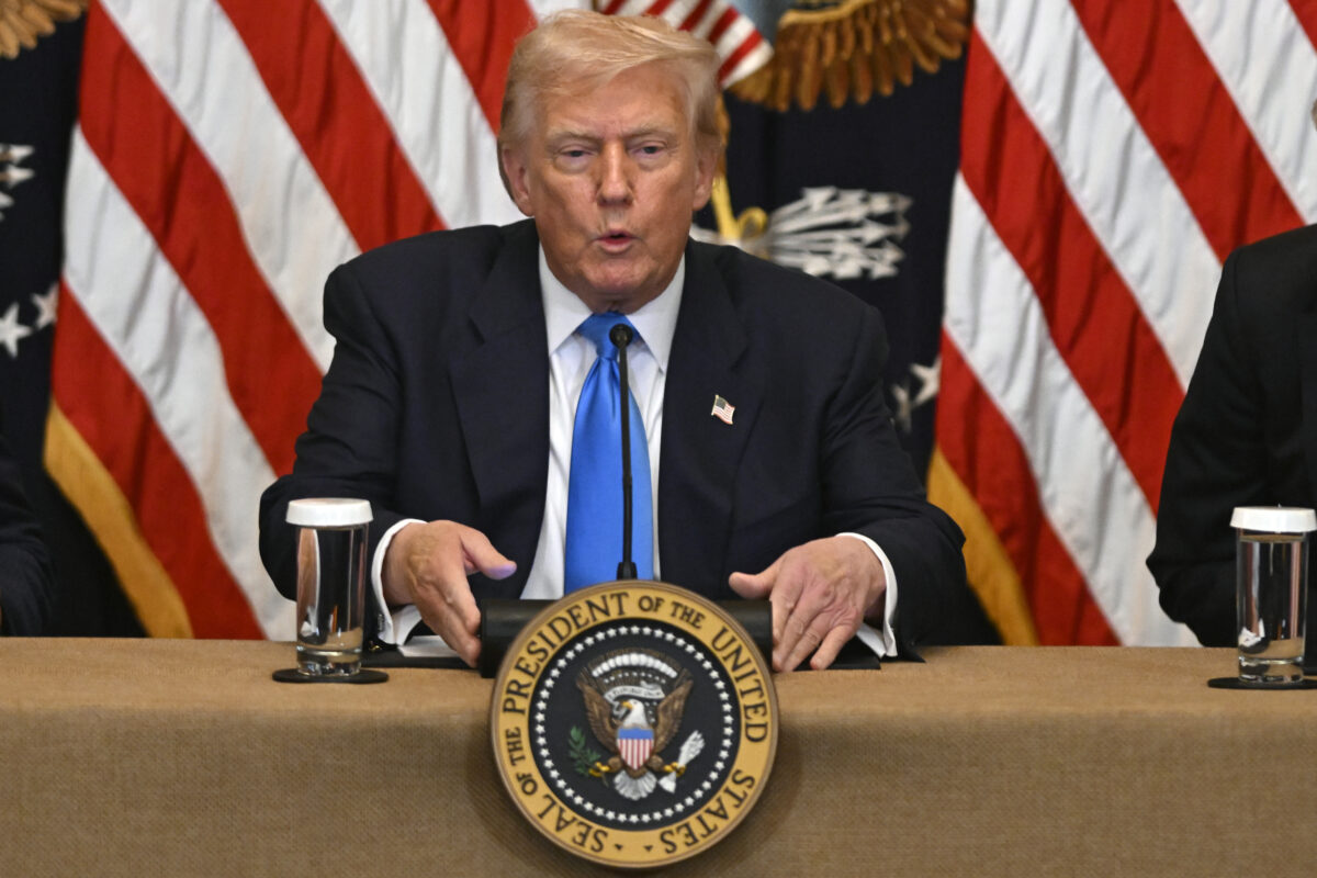 Trump signs order imposing new tariffs on a number of trading partners ...